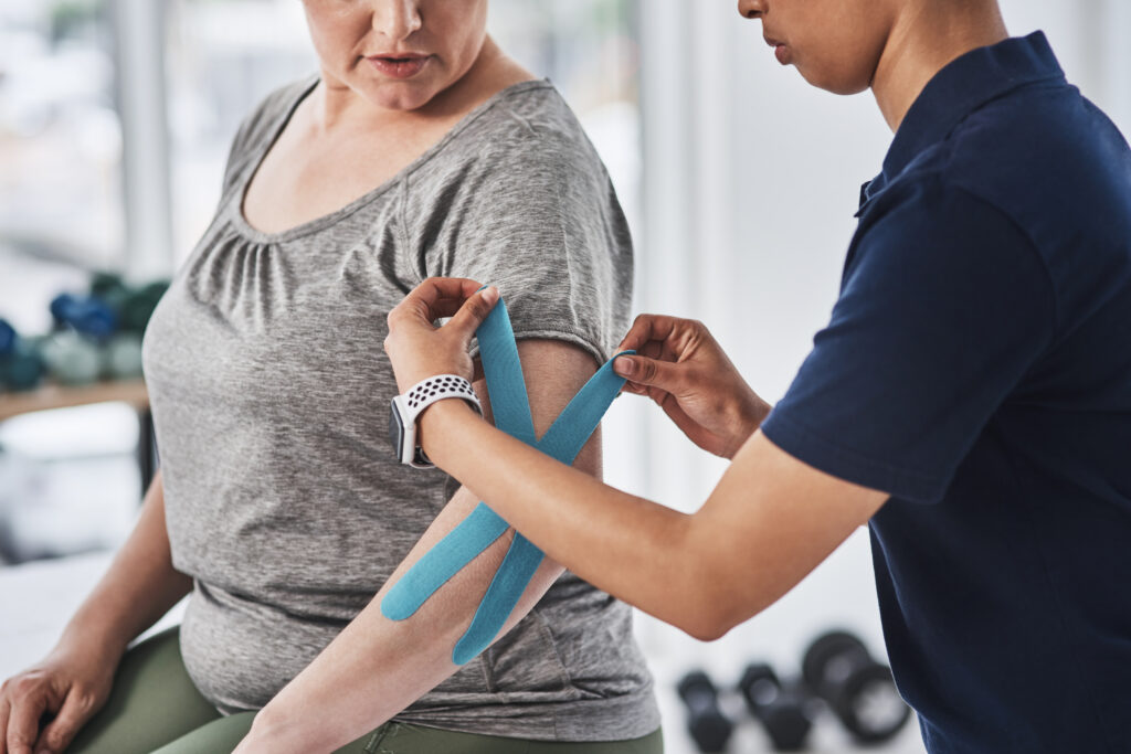 Therapeutic tape relieving pressure and tension on injured muscles