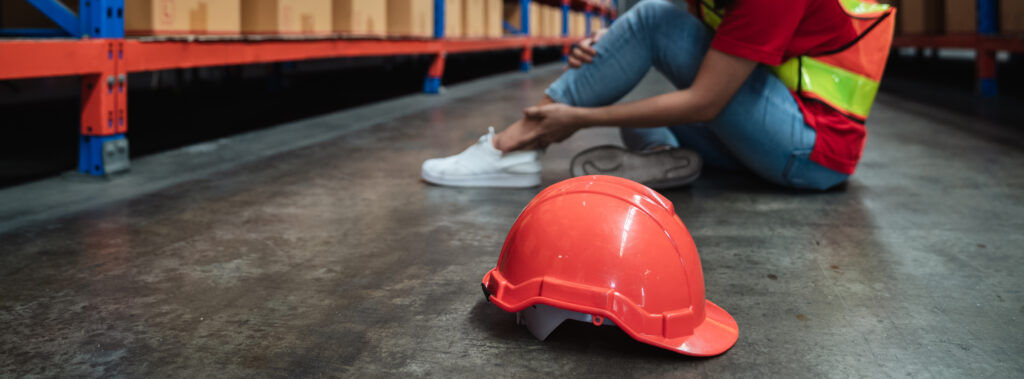 Female warehouse worker injured after a fall accident at work in Tampa
