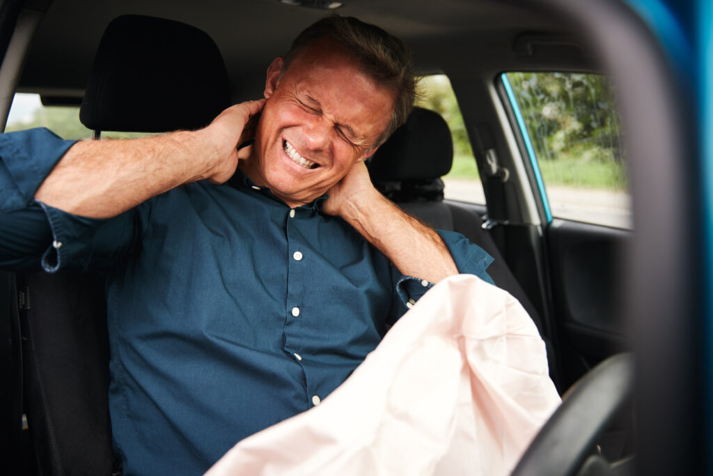 Man experiencing neck pain after a car accident in Tampa FL