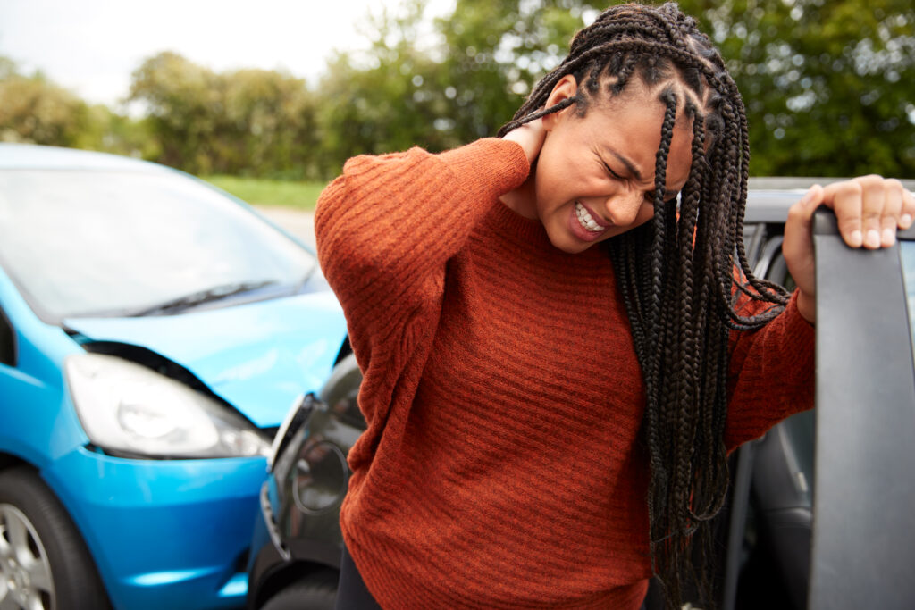Woman holding her neck in pain after a car accident in Tampa FL